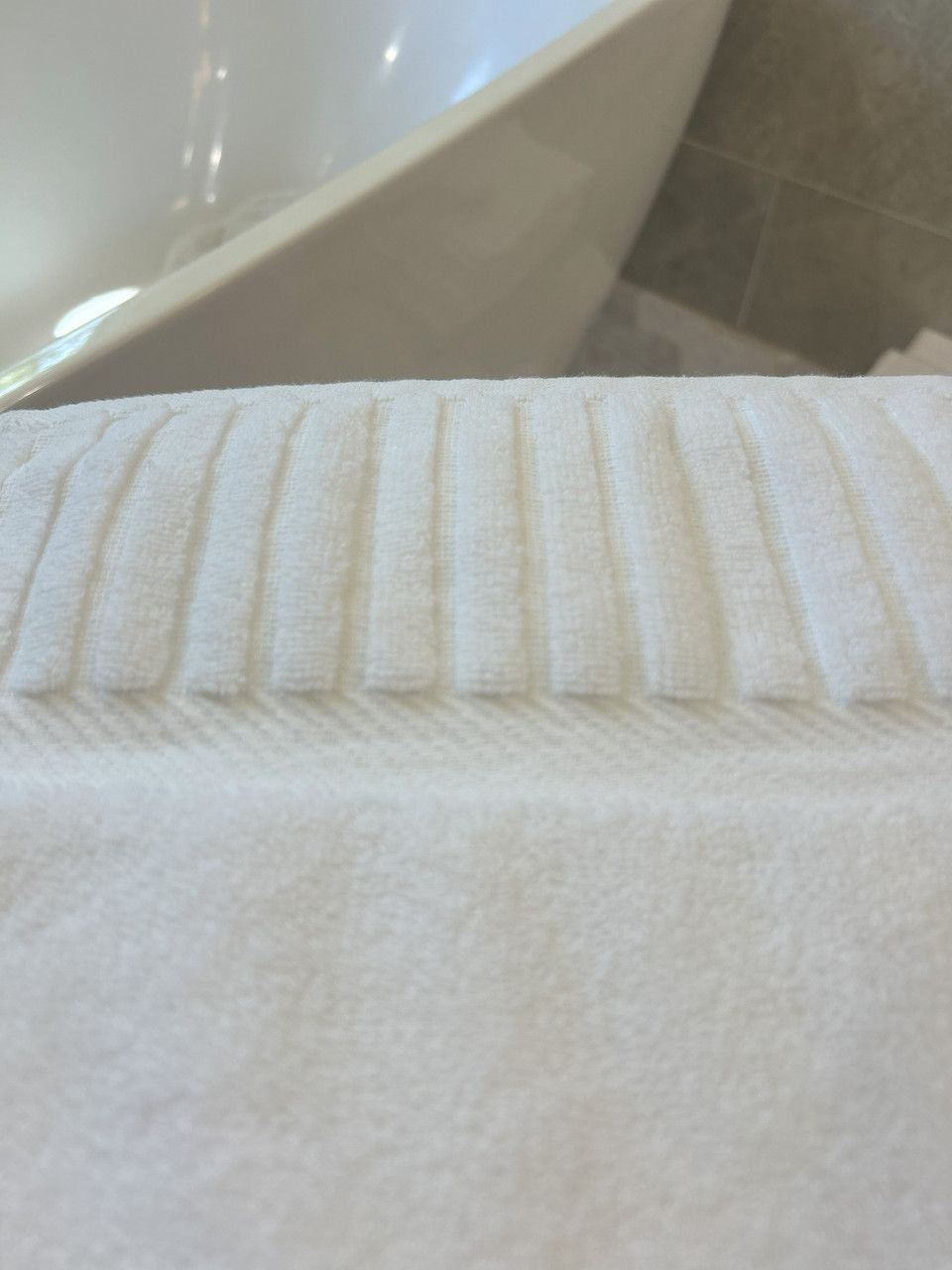 Luxury Piano Key Towels in White by Still Water